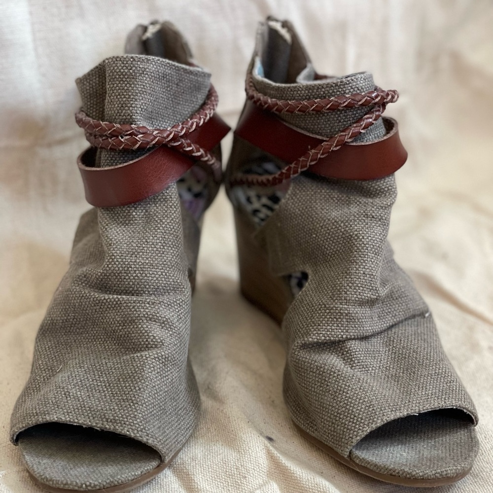 Like new Blowfish canvas peep toe cut out wedges.